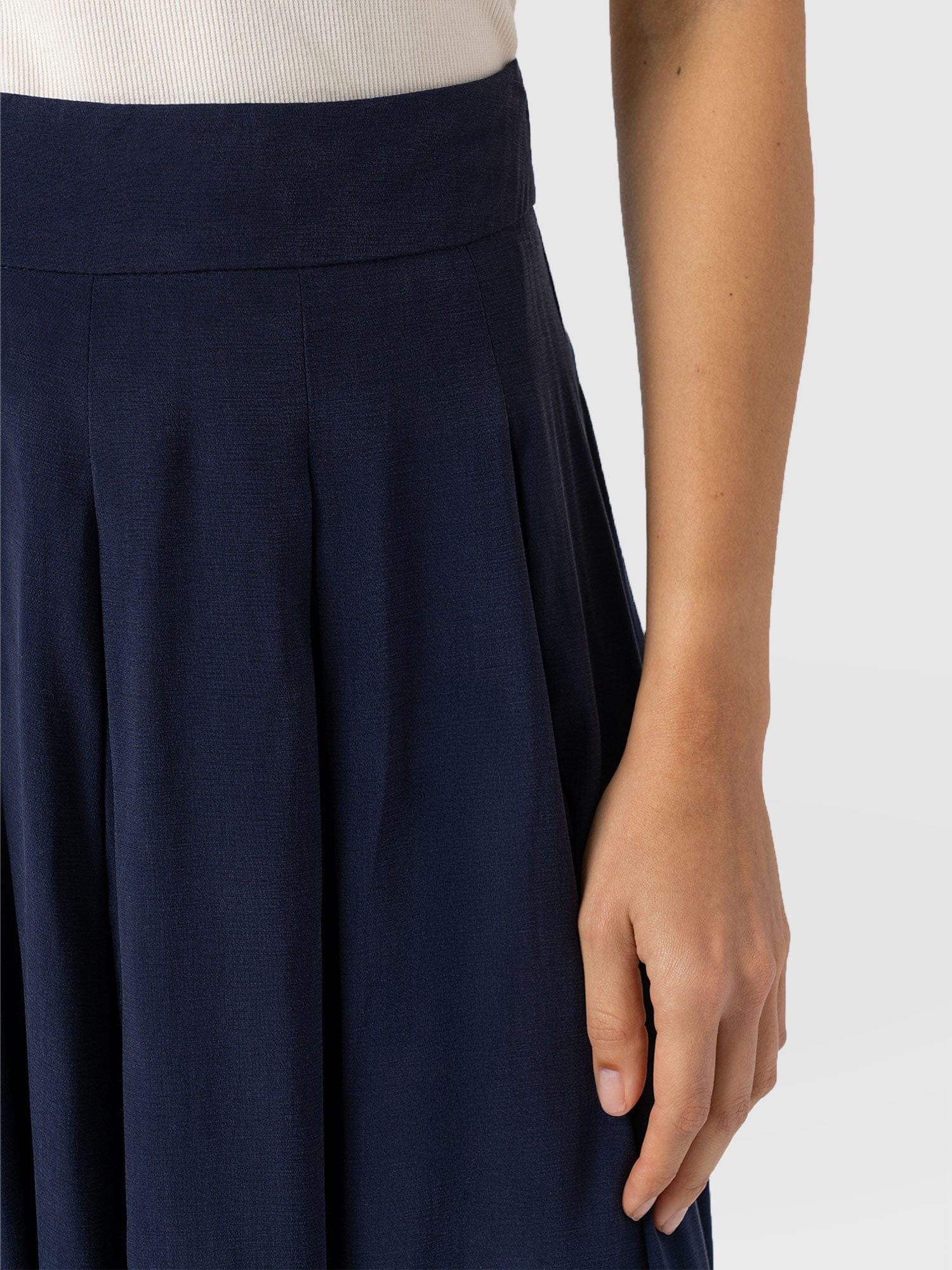 2782-eliza-pleated-skirt-navy-1.webp