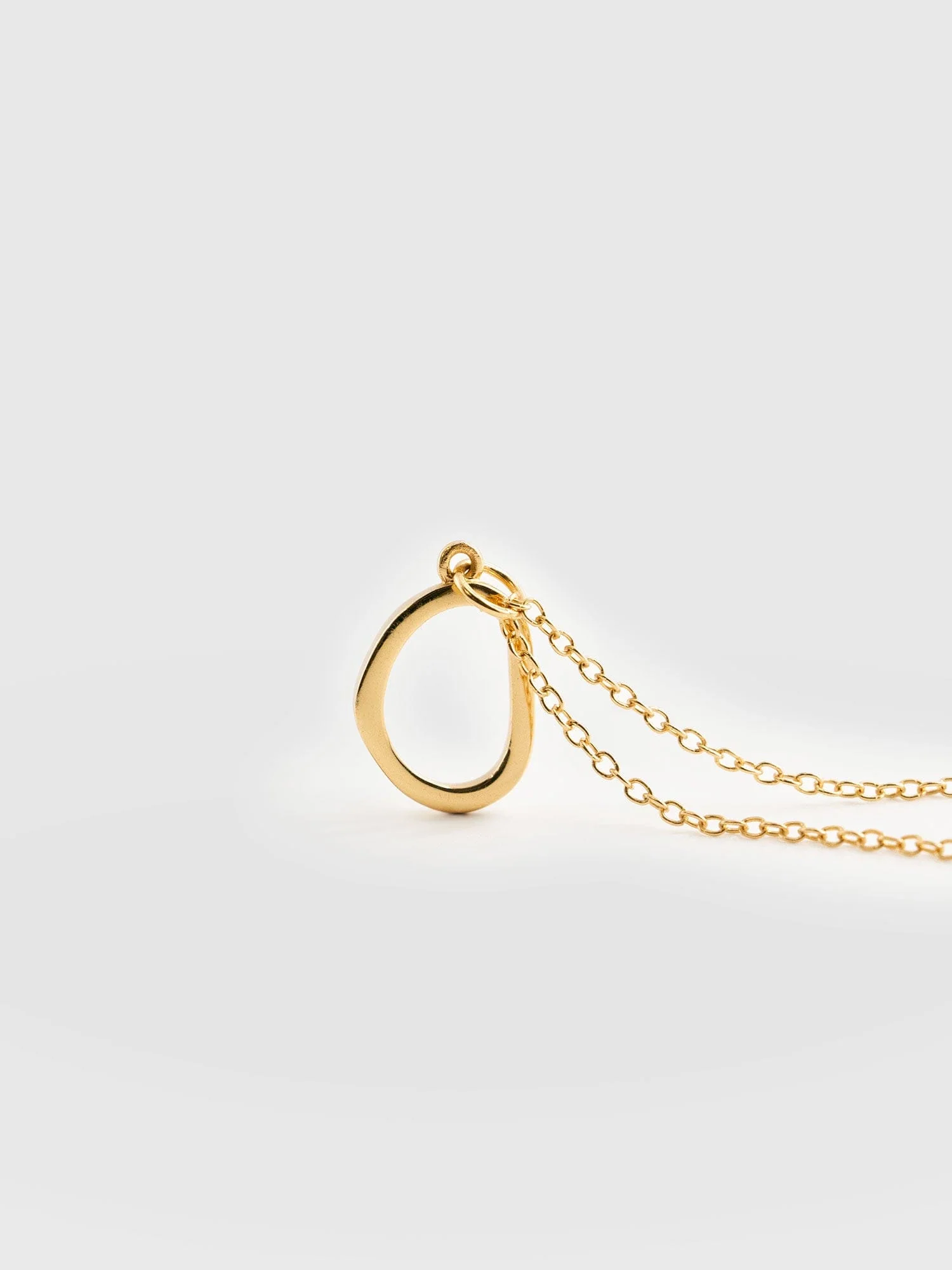 4996-organic-open-oval-charm-necklace-gold-1.webp
