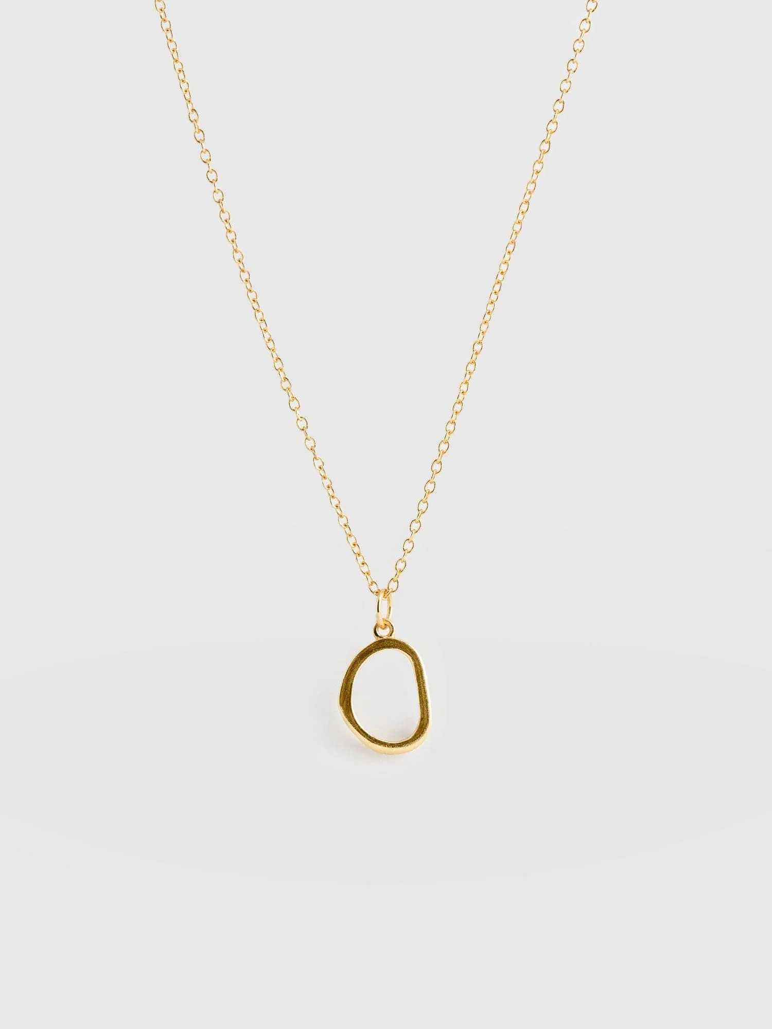4996-organic-open-oval-charm-necklace-gold-1.webp