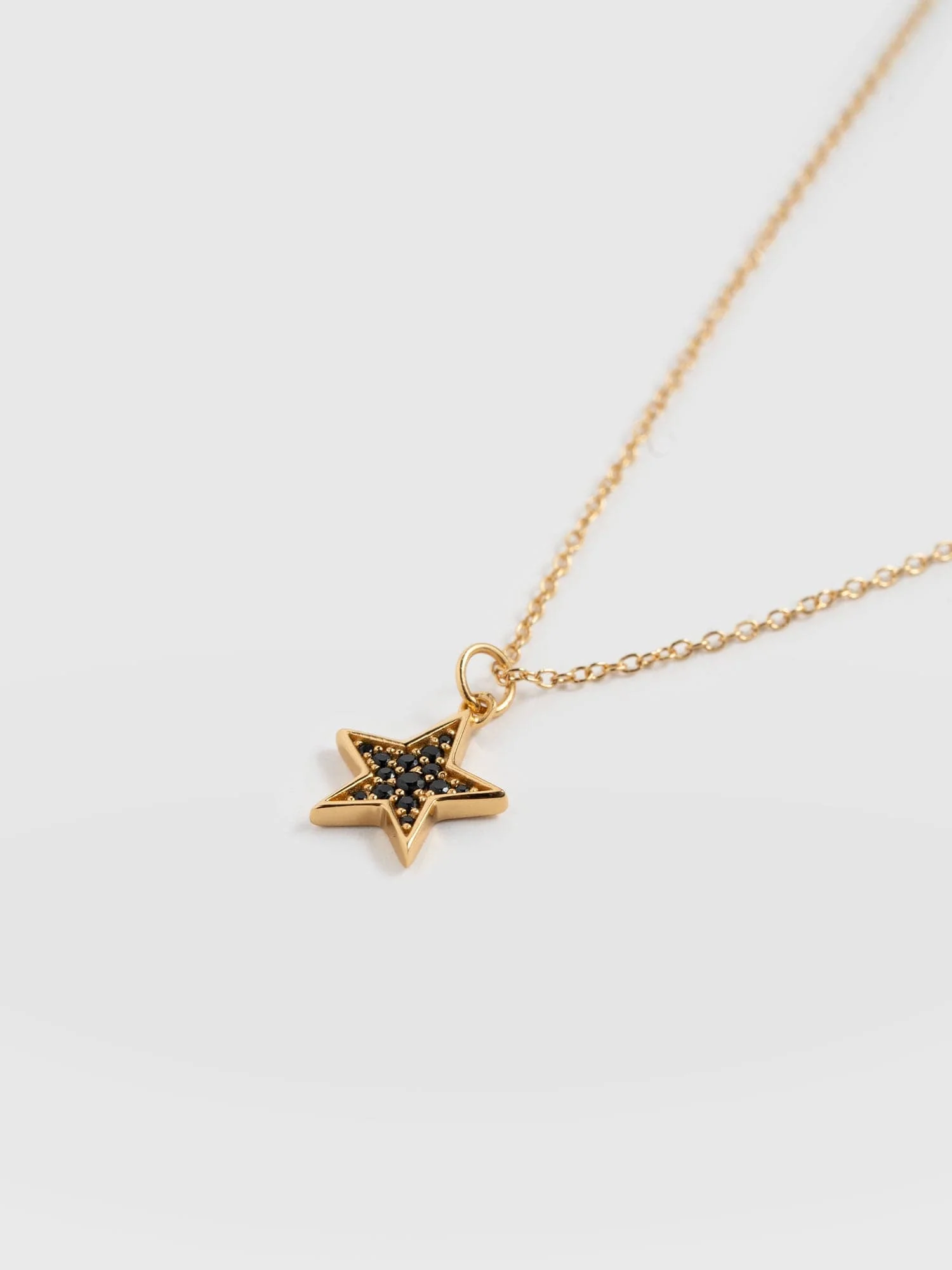 613-astral-star-necklace-gold-black-1.webp