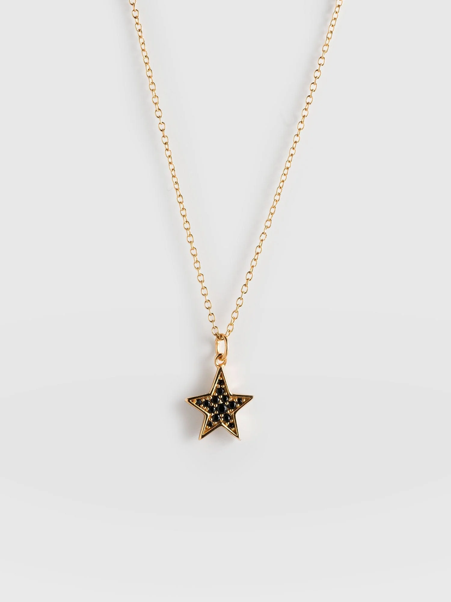 613-astral-star-necklace-gold-black-1.webp
