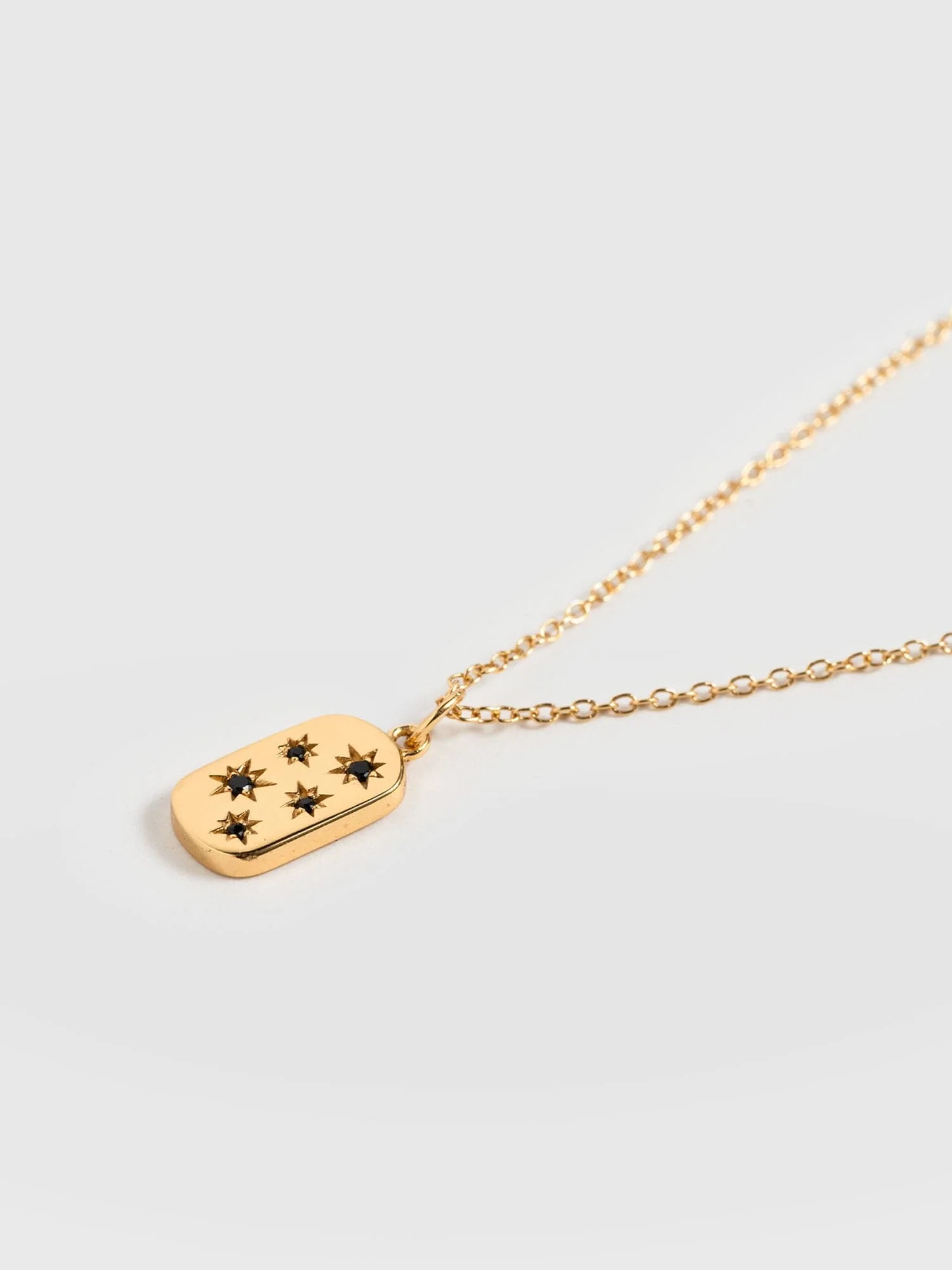 6268-scatter-star-charm-necklace-gold-black-1.webp