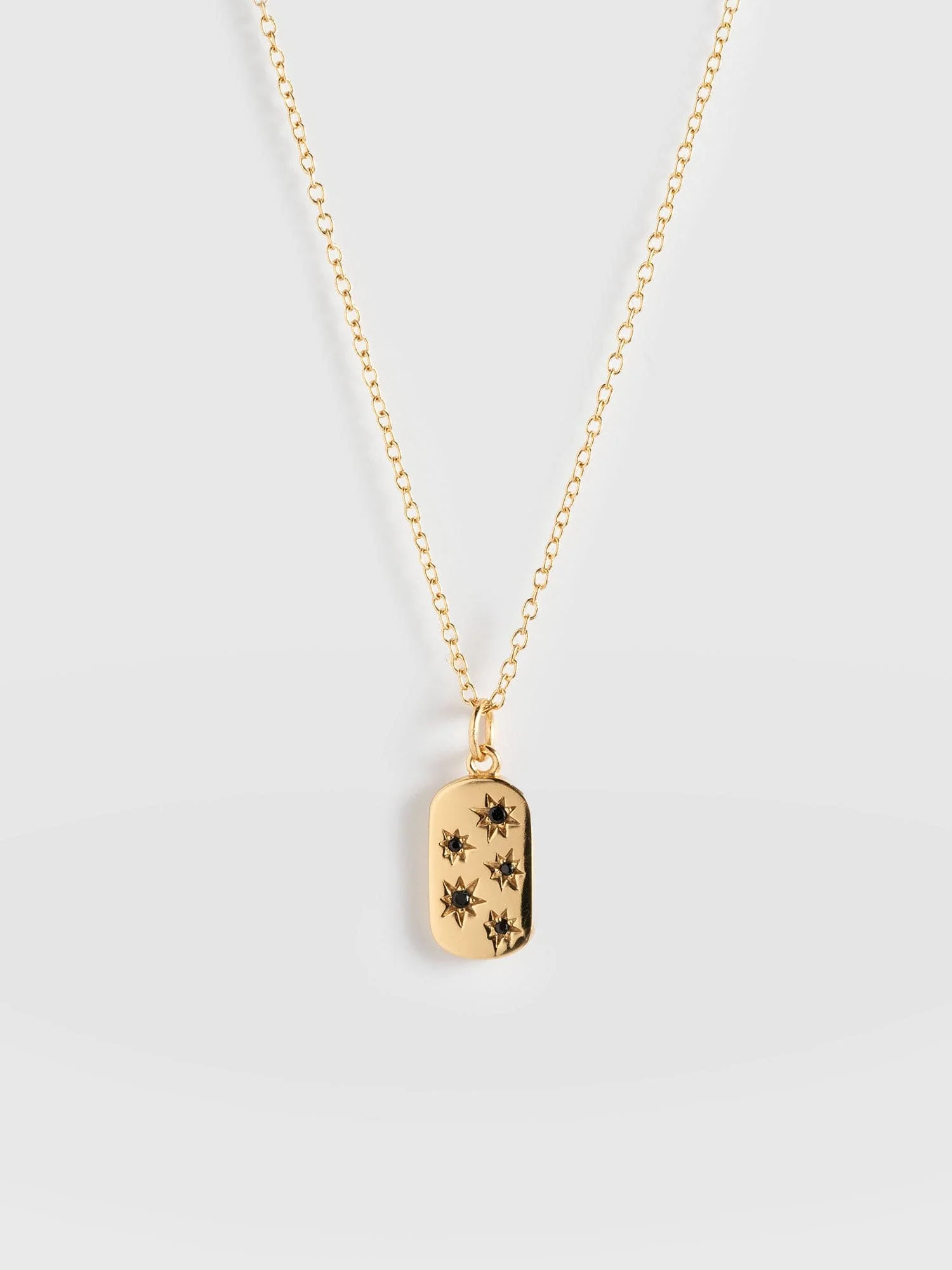 6268-scatter-star-charm-necklace-gold-black-1.webp