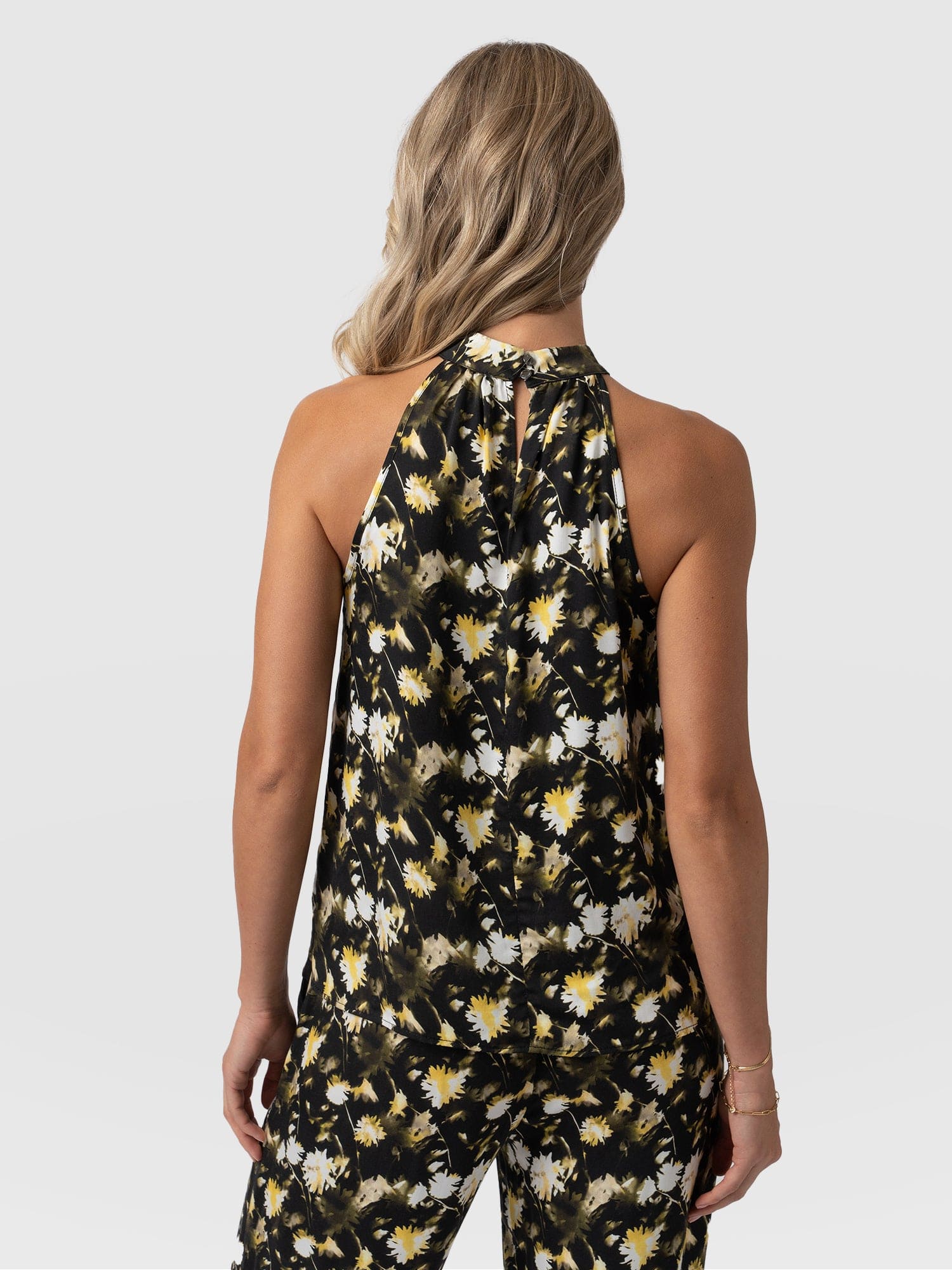 6737-tilda-halter-neck-black-daisy-floral-1.jpg
