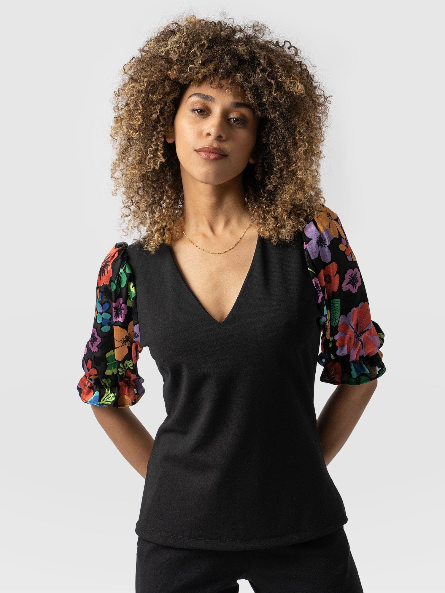 6747-tori-puff-sleeve-top-black-pop-floral-1.jpg