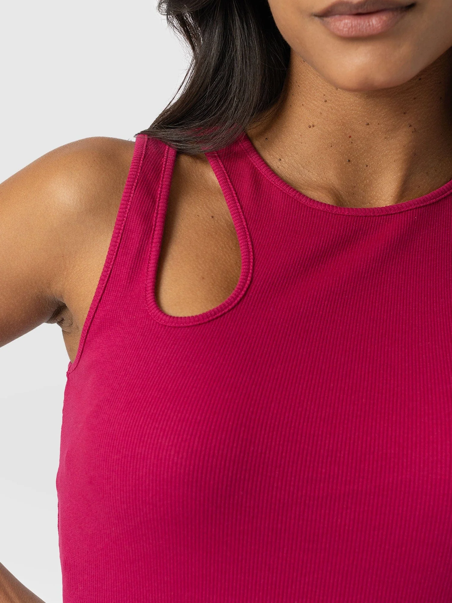 985-axel-cut-out-vest-fuchsia-pink-1.webp
